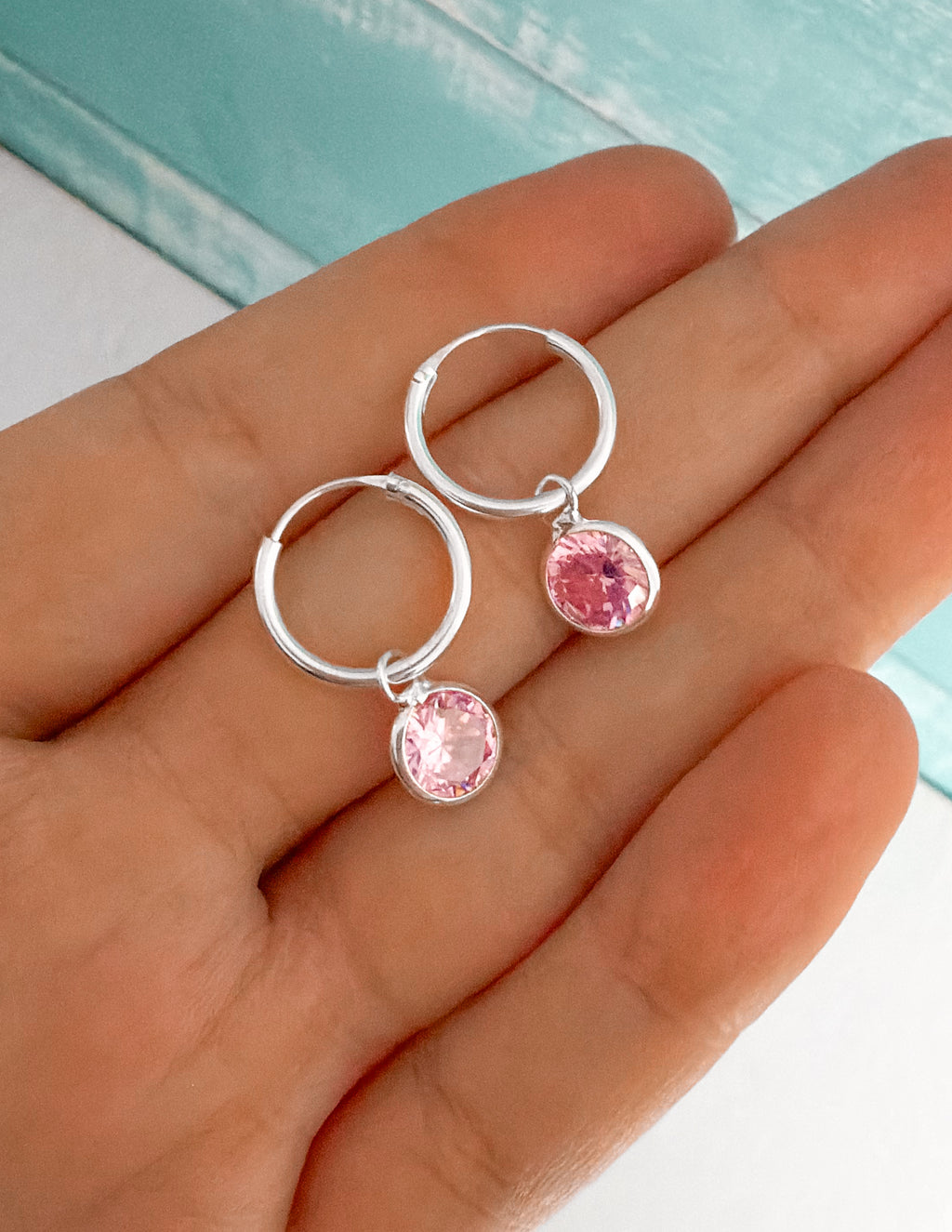 Argollas punto de luz rosa
