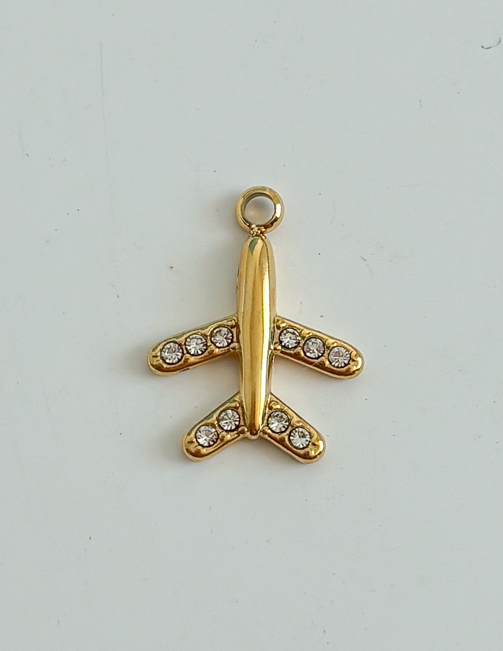 Charm avión Gold