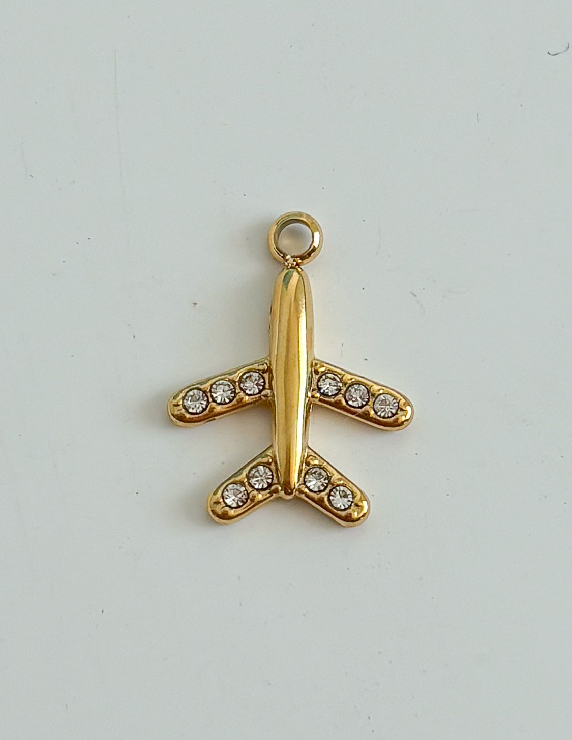 Charm avión Gold